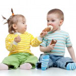 kids little girl and boy with ice cream